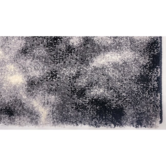 Lorenza Low Pile Rug - Black / White - 2 - Abstract art piece with swirling patterns, Black and white textured surface