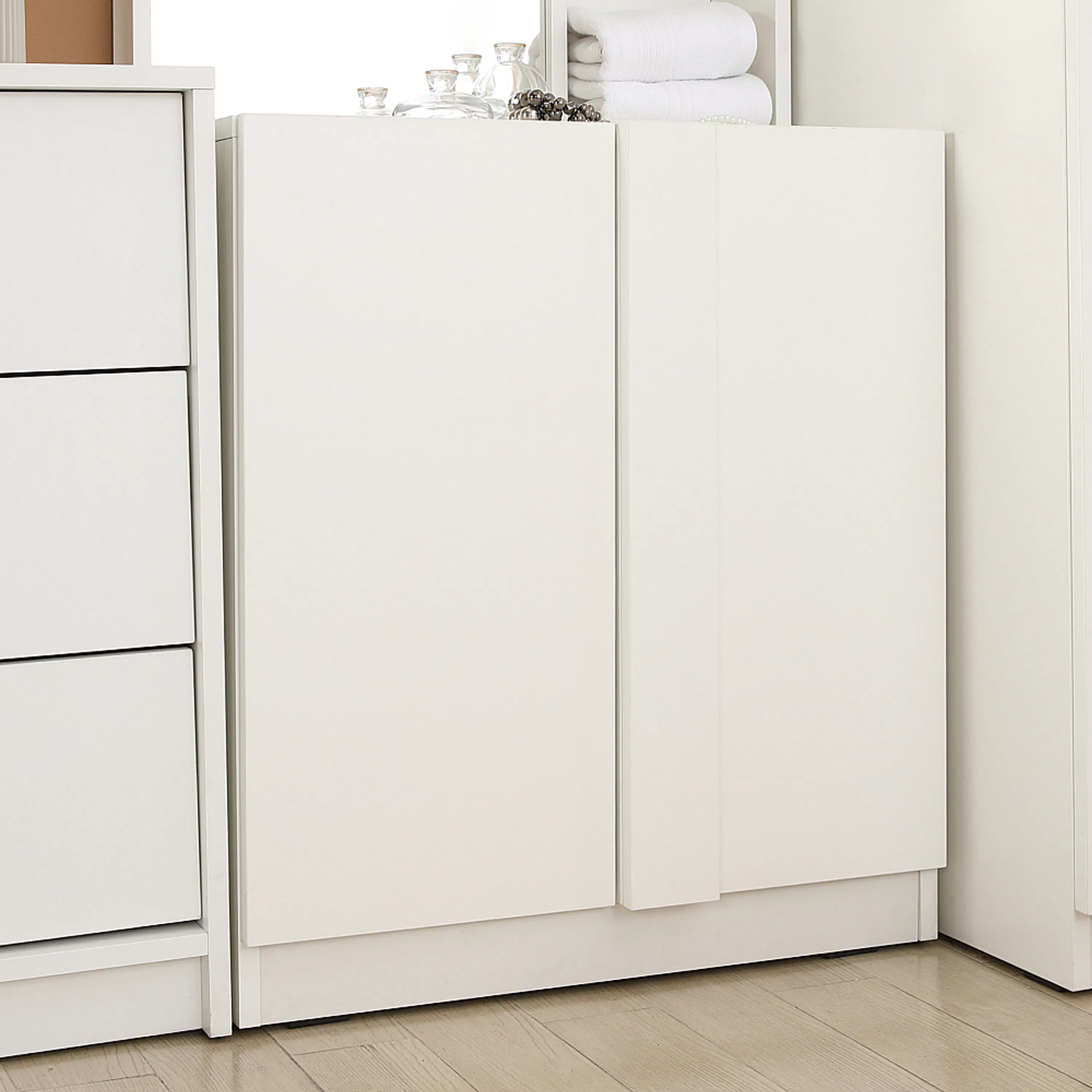 Melody Dressing Table Stand 0.6m - White - 10 - White minimalist dresser, neatly folded towels, glass bottles, metallic