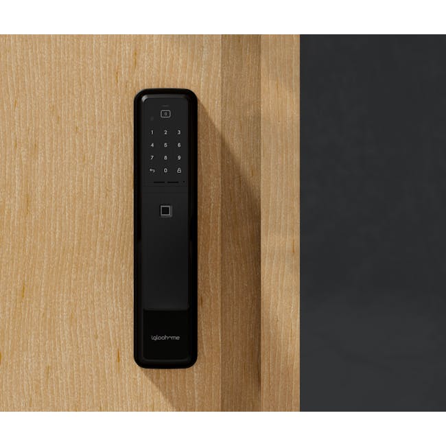 igloohome Push-Pull Mortise - Black - 6 - Sleek black remote control with numeric keypad on wooden surface, Modern
