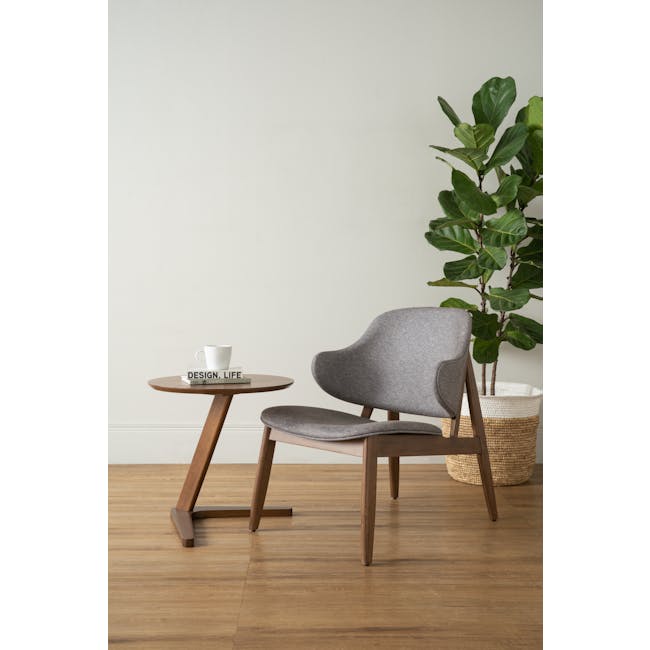 Trish Round Side Table - Walnut - 2 - Modern minimalist design, cozy indoor setting, stylish chair, wooden table, gray