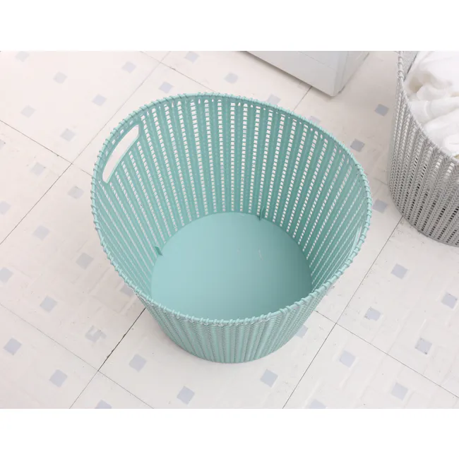 Alice Laundry Basket - White - 5 - Lime green laundry basket, white tiled floor, small pool of water, light blue interior