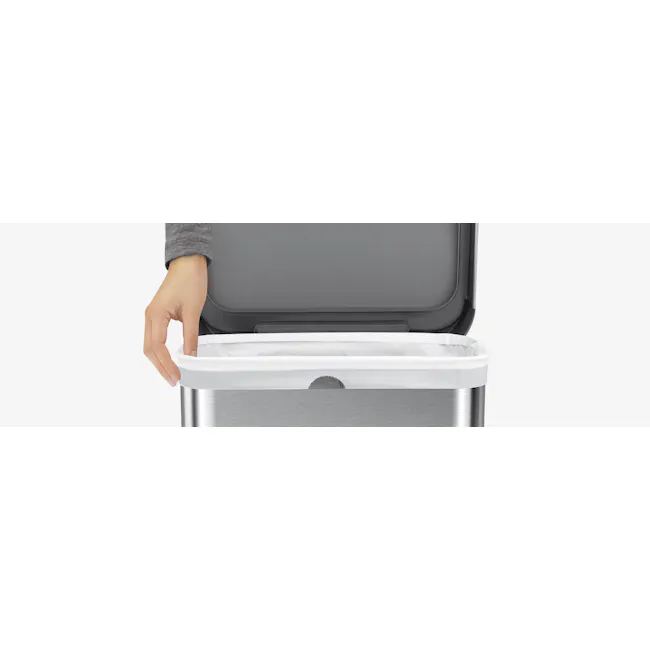 simplehuman Perfect Fit Liner 45L to 50L - N - 4 - Gray suitcase, open lid, white trash bin, person's hand, trash bin lid