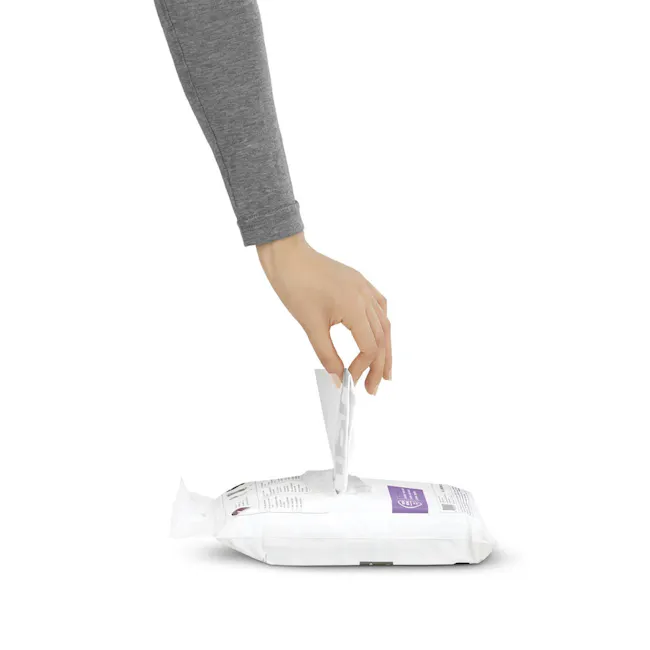simplehuman Perfect Fit Liner 45L to 50L - N - 3 - grey long sleeve hand, white paper bag, person placing paper, white