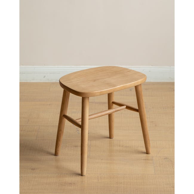 Pete Stool - Oak - 13 - Round wooden stool, minimalist design, natural wood finish, light brown color, sturdy legs, simple