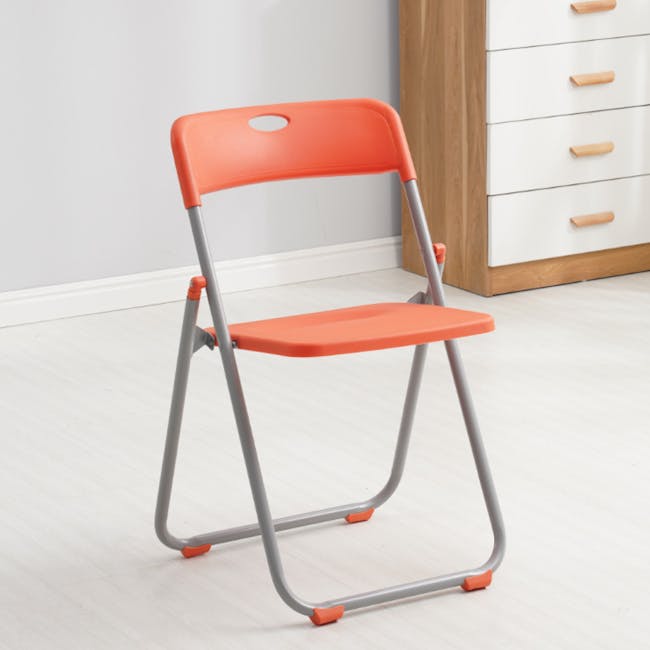 Nixon Folding Chair - Orange/Grey - 5 - Folding chair with orange seat and gray frame, modern design, minimalist style