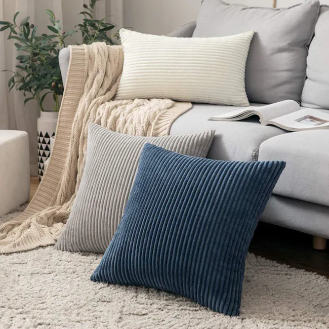 Emeri Large Corduroy Cushion - Blush - 6 - Cream, beige, and blue textured pillows, cream knitted throw blanket, light gray