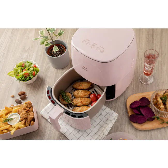 BRUNO 2.6L Air Fryer - Pink - 2 - Peach-colored electric steamer, pink control panel, food preparation, frying chicken