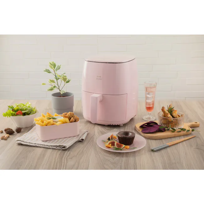 BRUNO 2.6L Air Fryer - Pink - 4 - Fruit and vegetable platter, pink toaster, glass of pink drink, nuts, breadsticks, figs