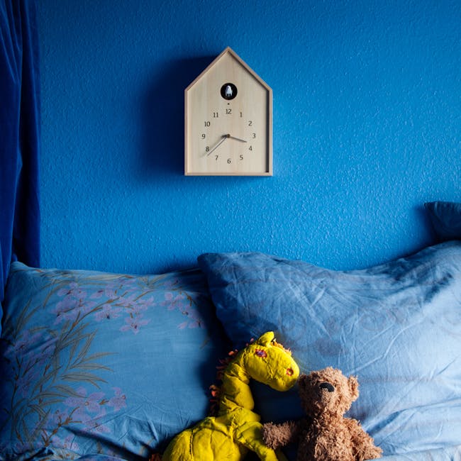 Birdhouse Clock - Natural - 4 - Timed clock, blue wall, wooden frame, hexagonal shape, black numbers, white hands, blue wall