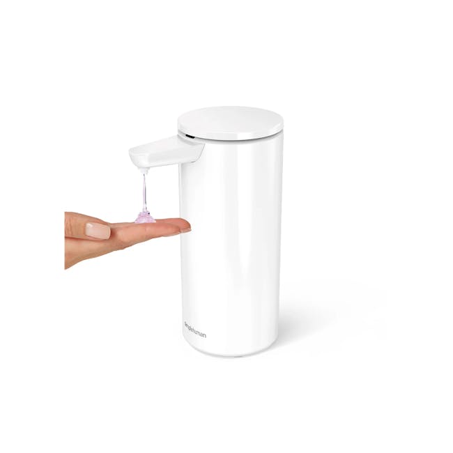 simplehuman 14oz Sensor Pump - White - 2 - White cylindrical dispenser, sleek design, small pump, pink liquid, hand holding