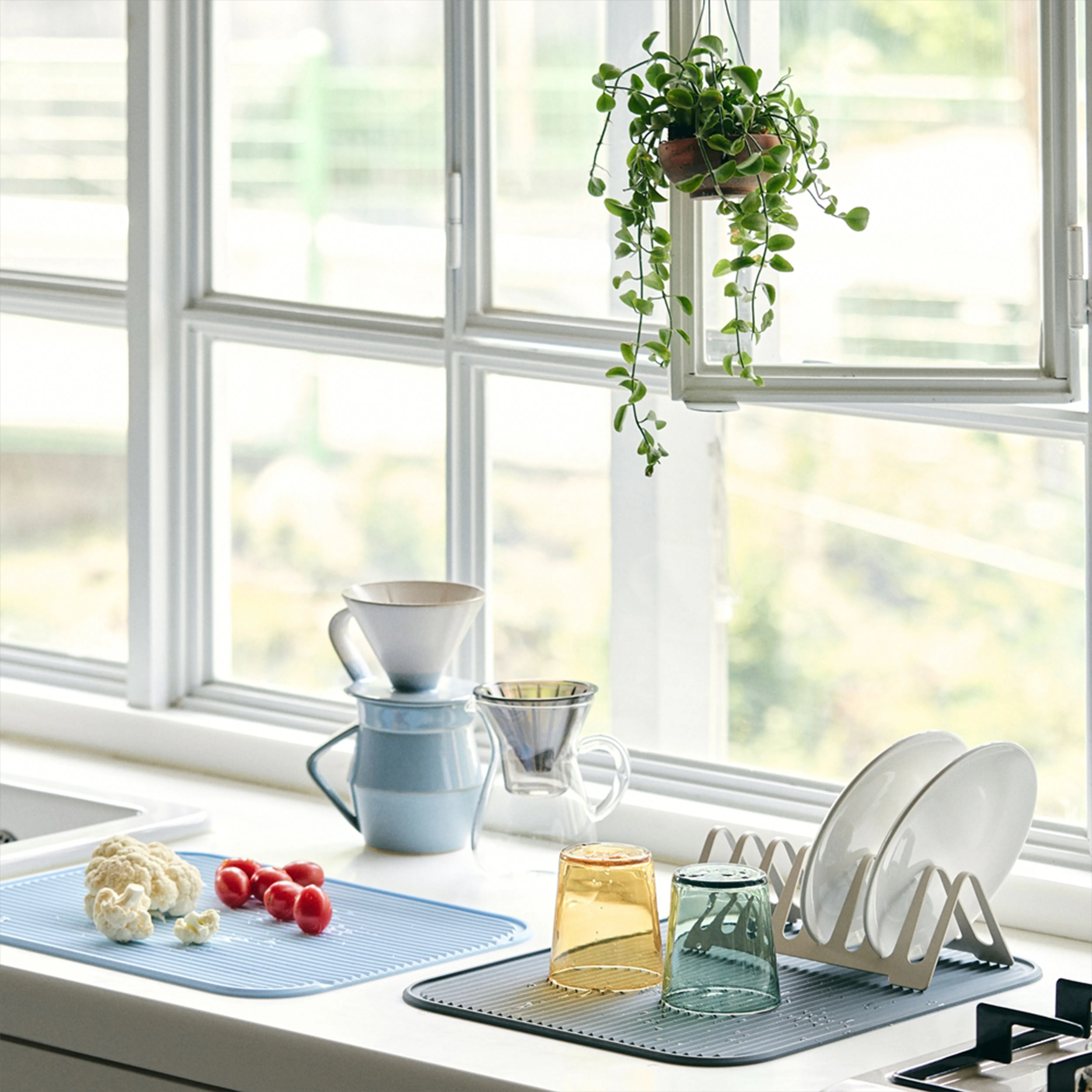 Modori Beige Drying Rack + Soft Blue Drying Mat Set - 9 - Fresh kitchen countertop, natural light streaming in, hanging