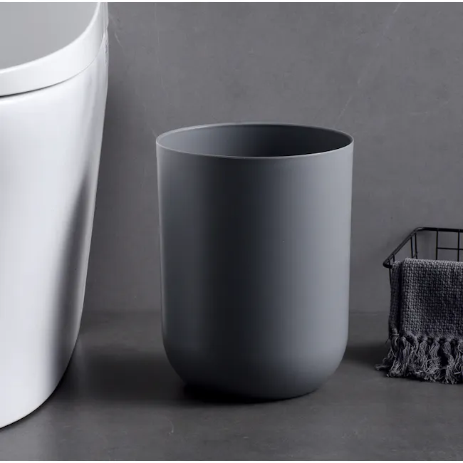 Ian Waste Bin - Grey - 5 - White toilet, gray cylindrical container, modern bathroom, minimalist design, sleek fixtures