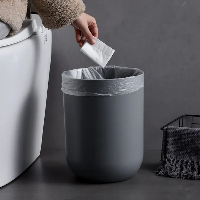 Ian Waste Bin - Grey - 2 - white fluffy bathrobe, gray toilet, gray trash can, person holding mask, white sanitary pad, gray