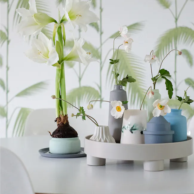 Edd Nordic Tray with Stand - Black - 4 - White lilies in a vase, green foliage, indoor plant arrangement, modern decor
