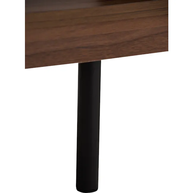 (As-is) Delani Coffee Table - 13 - Wooden table, black cylindrical object, minimalist design, sleek surface, high contrast