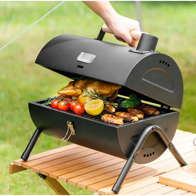 Flame Master BBQ Mini Portable BBQ Drum - Black - 2 - Outdoor barbecue grill, black metal design, open lid, cooking meats