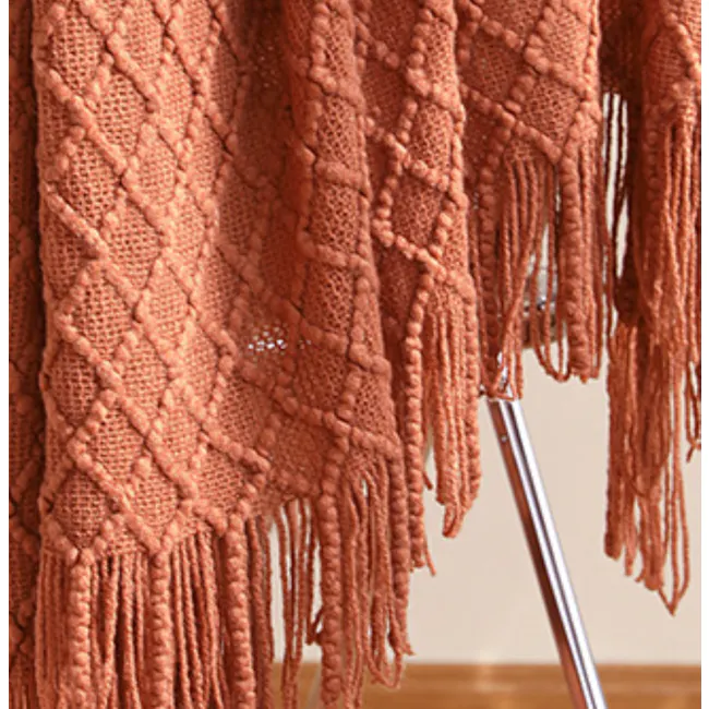 Hanako Knitted Throw - Burnt Orange - 4 - Rustic woven scarf with intricate patterns, Delicate fringe detailing on a cozy
