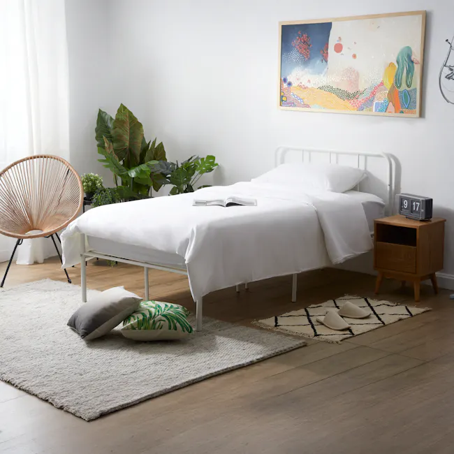 Owen Single Metal Bed - White - 2 - Modern minimalist bedroom, cozy atmosphere, white bed, white comforter, wooden