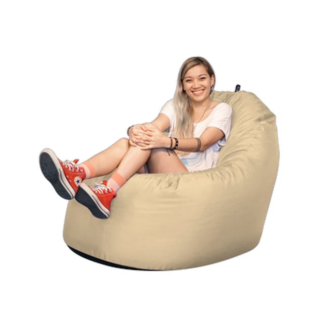 Doob Oomph Water-Repellent Bean Bag Chair - Winter Wheat (2 Sizes) - 2 - woman sitting on bean bag chair, casual outfit