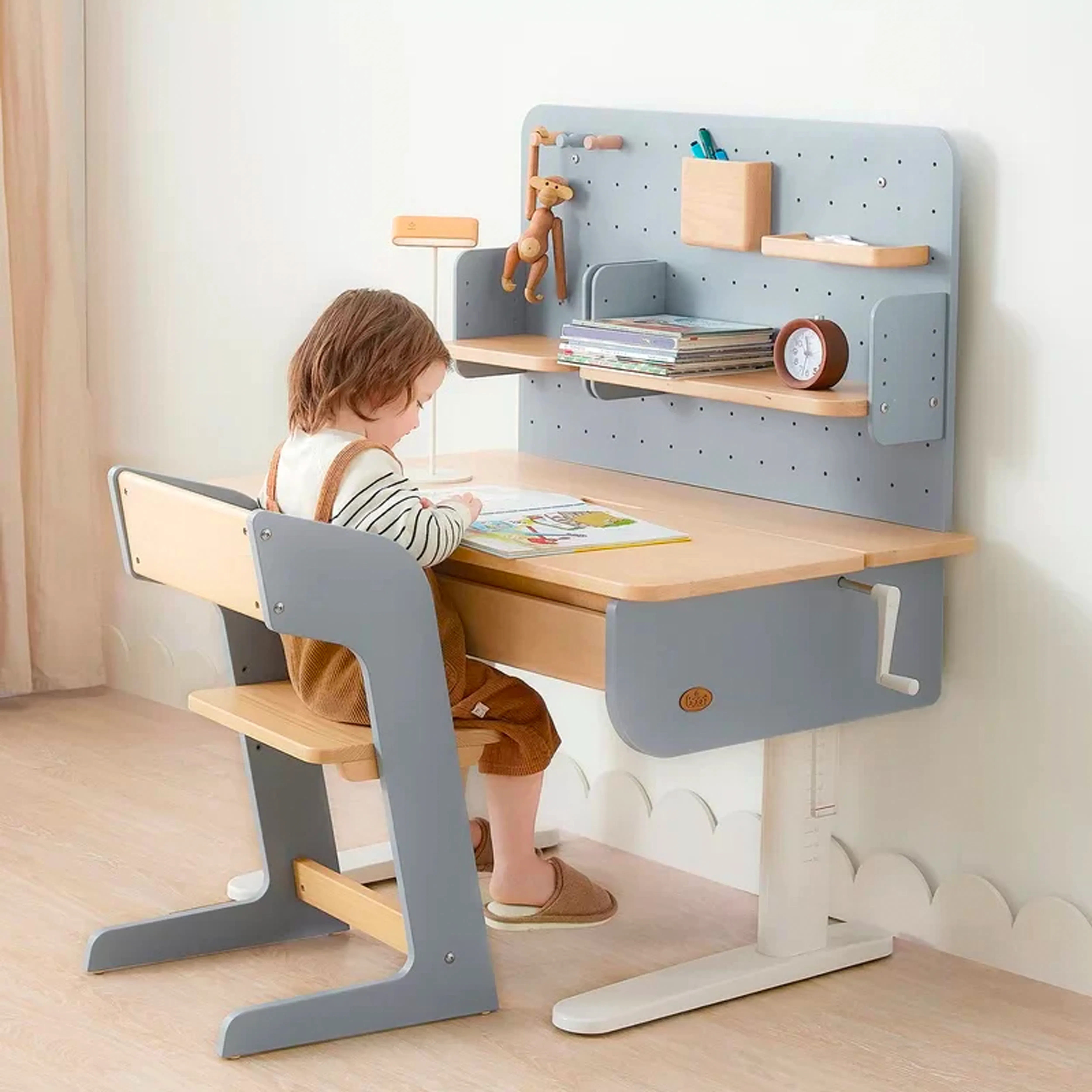 Boori Ergonomic Desk with Pegboard Hutch 1m - Cherry - 10 - child sitting at modern wooden desk, child reading book, child