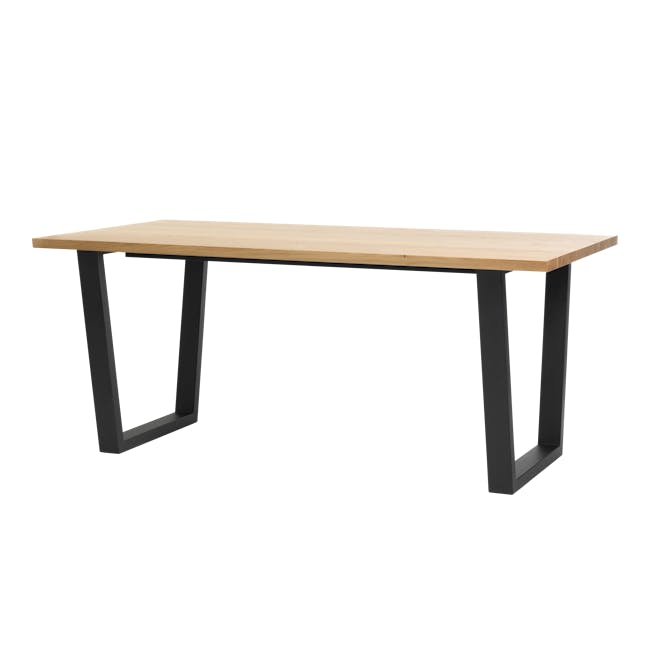 (As-is) Reno Dining Table 2.1m - 1 - Modern minimalist table with sleek black legs, light wood top, geometric design