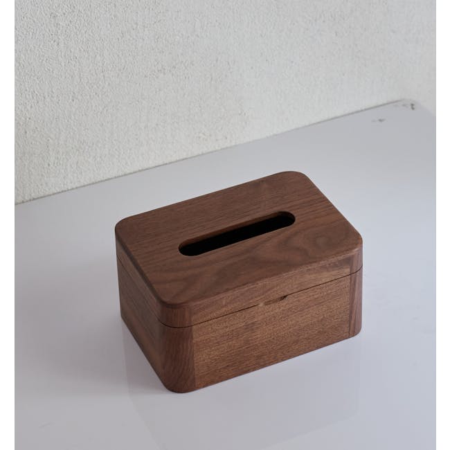 Kenji Tissue Box - 12 - Wooden box with smooth surface, rectangular shape, dark brown finish, small rectangular slot, placed