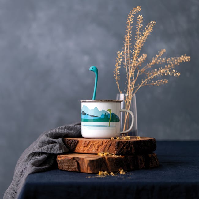 OTOTO Cup of Nessie - Tea Infuser and Cup - 5 - mug with blue handle, ceramic design, nature theme, wooden coaster, rustic