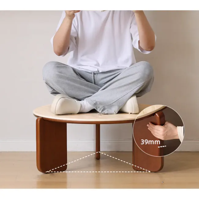 Blair Round Coffee Table - Travertine (Sintered Stone) - 8 - sofa, cross-legged, person, sitting, white shirt, gray pants