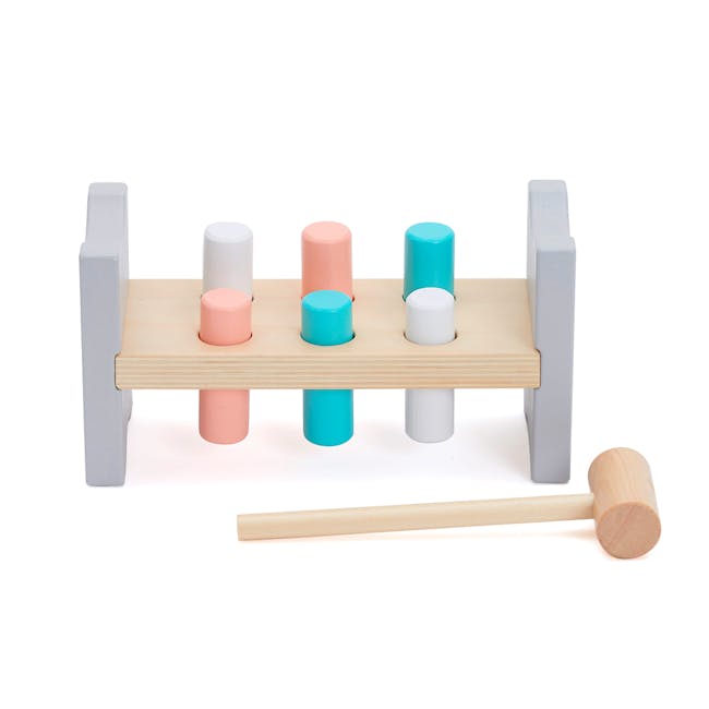 Bubble Wooden Hammer Bench - 1 - Wooden toy shelf with various colored cylindrical objects, placed on gray wooden legs