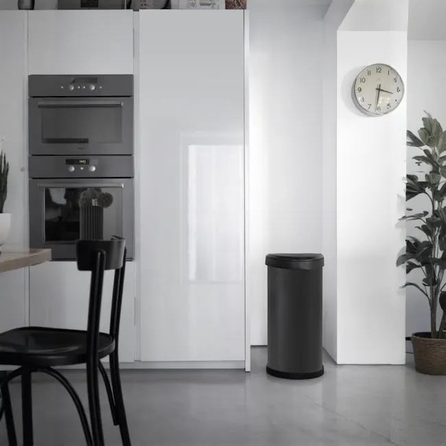 Deco Push Bin 40L - Black - 2 - Modern kitchen with sleek white cabinets and stainless steel appliances, minimalist design