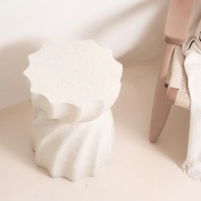 Evelyn Swirl Terrazzo Side Table - 3 - White textured stool, minimalist decor, soft pastel background, wooden chair, cozy
