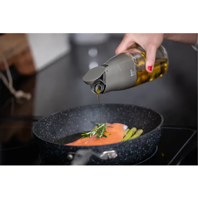 Zuutii Drip-Free Oil Carafe - Deep Blue - 9 - Golden olive, salmon, rosemary, cooking oil, black skillet, stovetop, culinary