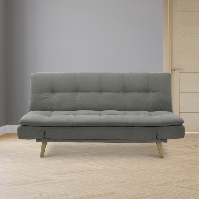 Kara 3 Seater Sofa Bed - Pigeon Grey - 11 - Modern gray upholstered sofa, light wooden floor, herringbone pattern