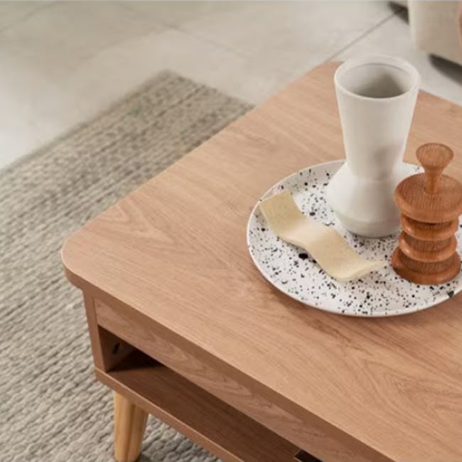 Muna Lift-Up Coffee Table - Natural - 4 - Wooden coffee table, speckled plate, white ceramic cup, wooden coaster, small