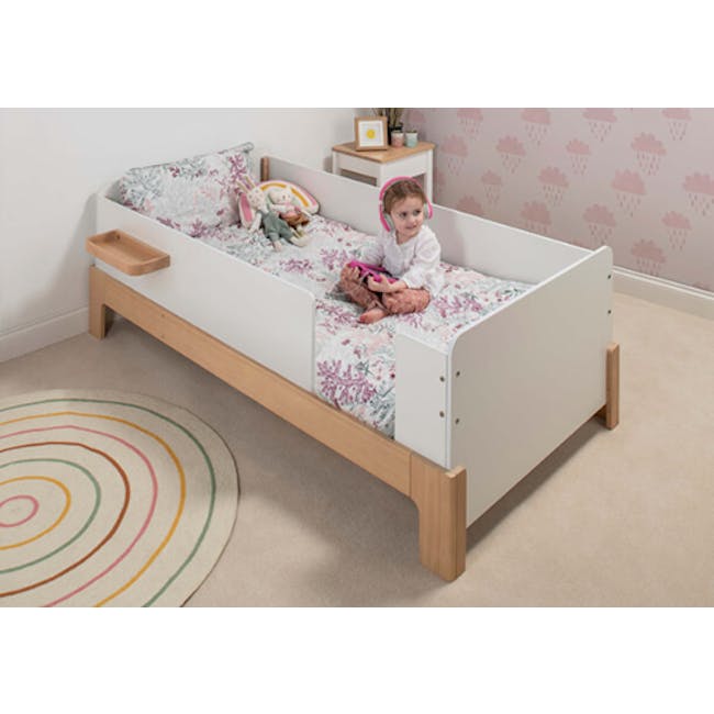 Natty Guarded Single Bed - Barley White & Almond - 2 - Children's bedroom with a white bed frame featuring floral patterns