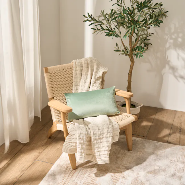 Alyssa Velvet Lumbar Cushion Cover - Jade - 7 - Light beige woven chair, light wooden armrest, light green cushion