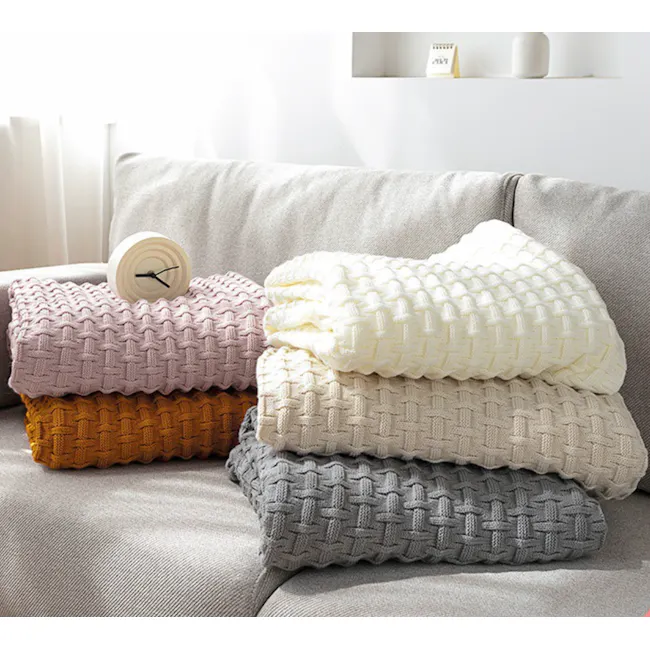 Hera Throw - Beige - 4 - Soft, knitted throw pillows in pastel shades of pink, purple, yellow, white, and gray, neatly