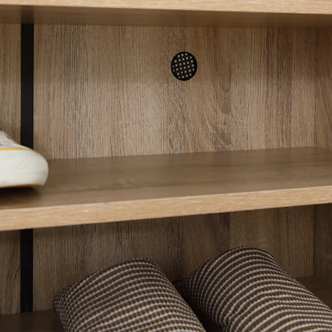 Tyler 2 Door Shoe Cabinet - Oak - 7 - Wooden shelf, brown textured wall, black perforated object, white shoe, wooden shelf