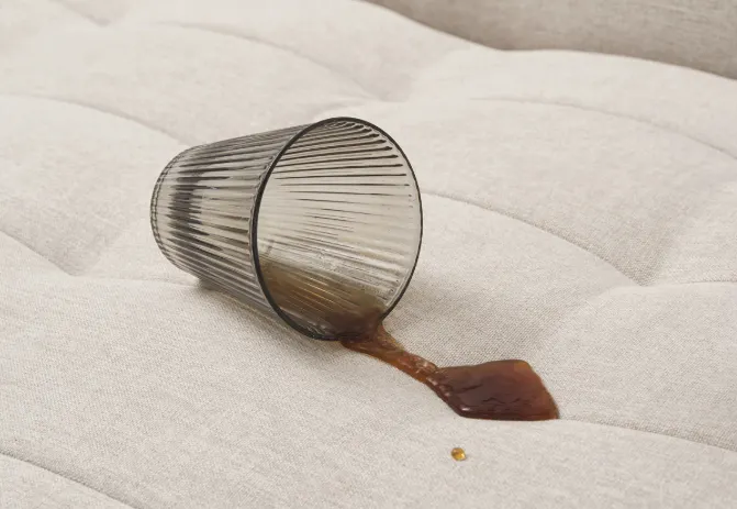 Tessa L-Shaped Sofa Bed - Beige (Eco Clean Fabric) - 16 - Glass on cushion, coffee spill, brown liquid, coffee stains