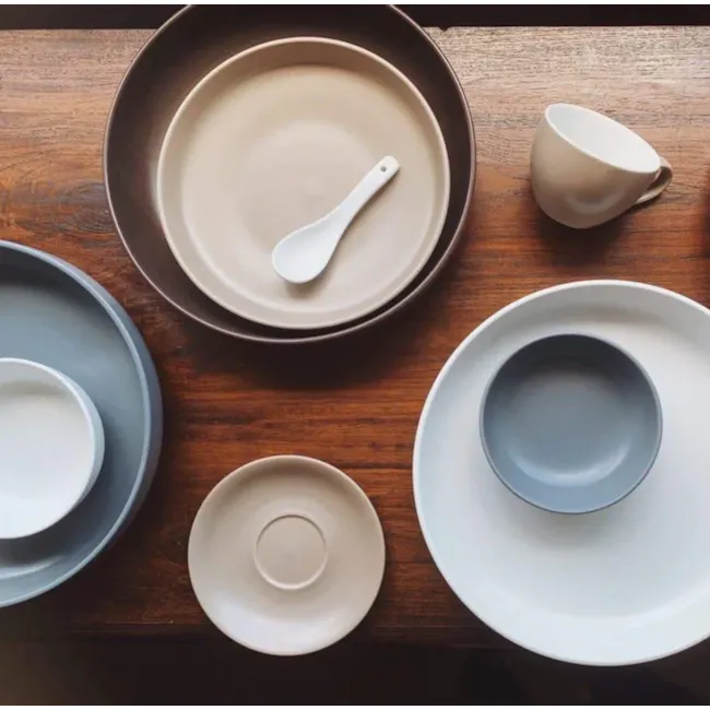 Base Piece DeTerra 5.75” Soup Bowl - Stone Blue - 4 - muted beige plates, minimalist dining setup, rustic wooden table
