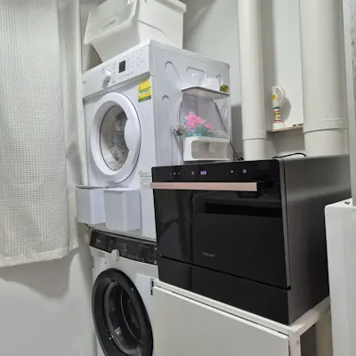 Customer home photo 2: It fits perfectly as so my dishwasher can be placed on top of it! It is stable too!