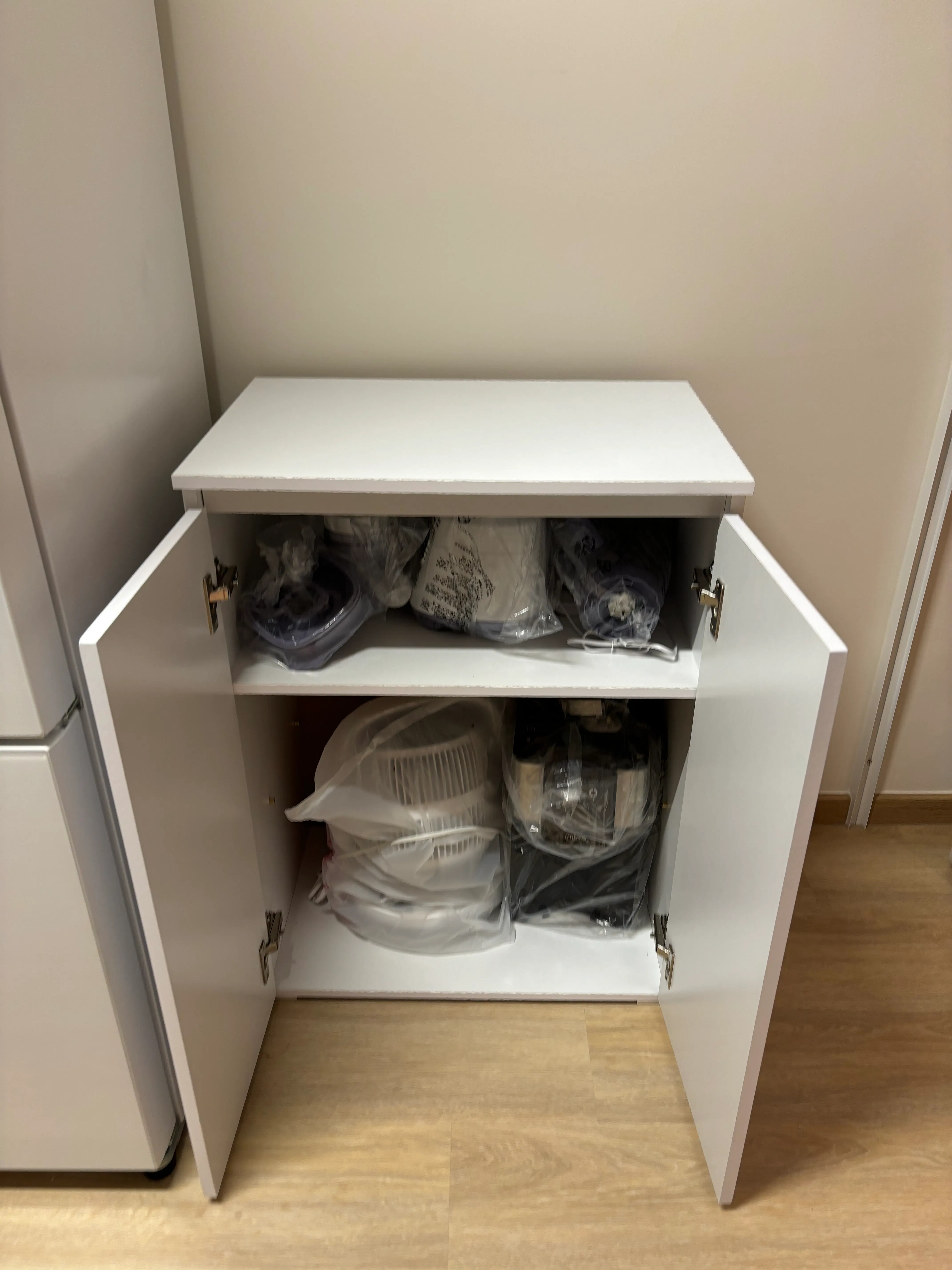 Customer home photo 4: It’s clean and minimalist looking at a nice height. I like that one of the shelves can be removed.