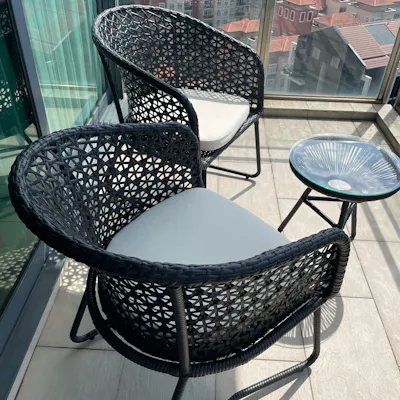 Customer home photo 2: A fantastic little patio set that is indeed very comfortable to sit in for long periods. Hopefully it will withstand the rain and sun out on our balcony, but so far so good.