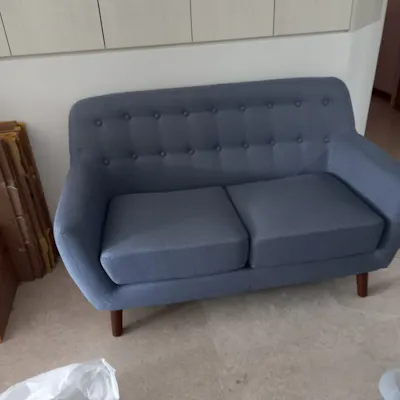Customer home photo 9: Functional sofa that fits into 2 bedroom apartment. The seat is not so deep nor soft for a super comfortable lounge but it is good value.