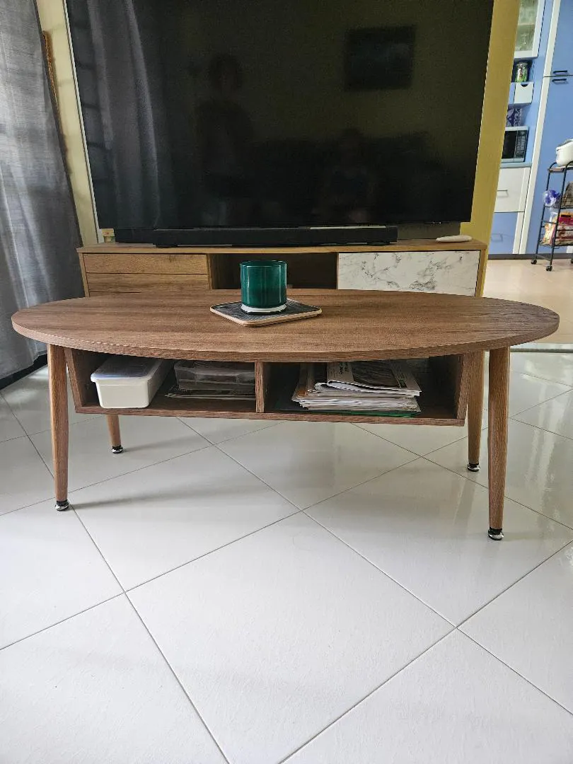 Customer home photo 1: Coffee table blended well with our sofa set and tv console unit.
Overall looks great in our living room.