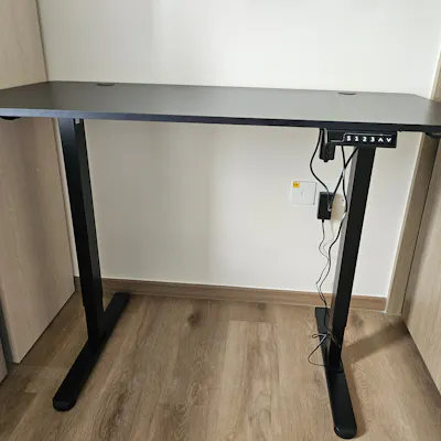 Customer home photo 3: The computer table looks nice and sturdy. The mechanism works smoothly as well.