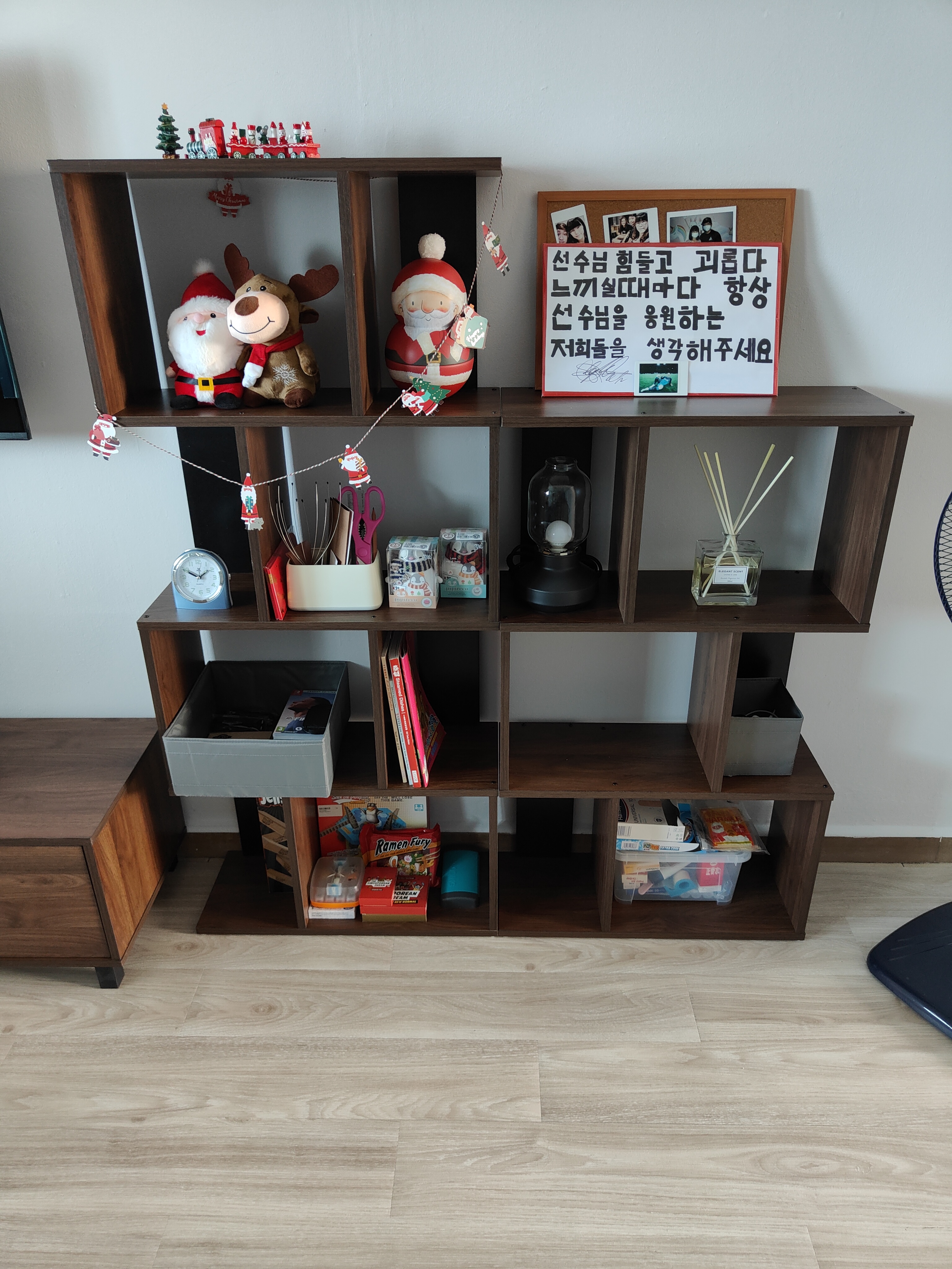 Customer home photo 8: I combine the two bookshelves to make it a display and storage corner for my living room. Love it!