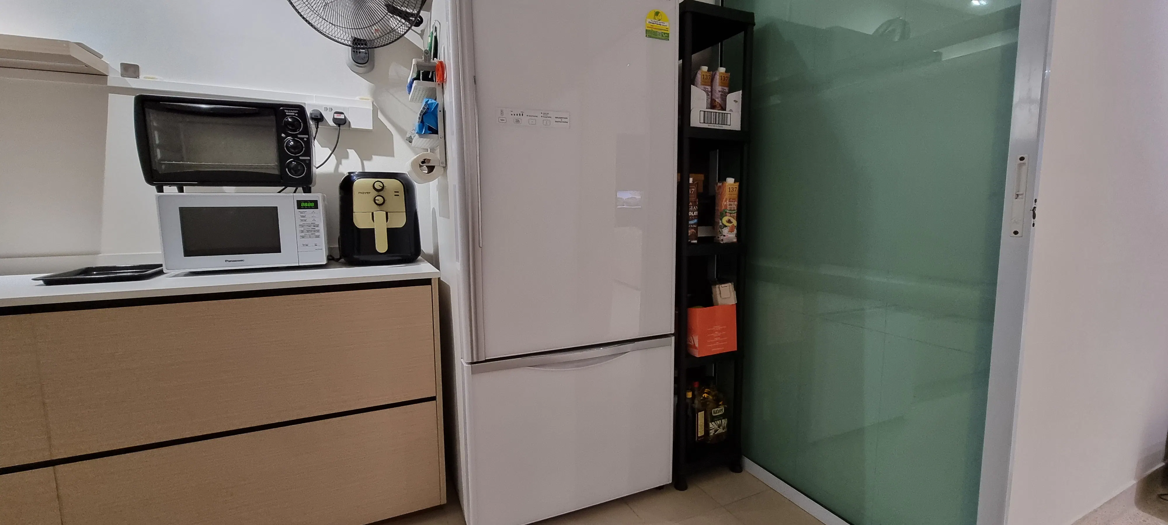 Customer home photo 1: Just the right dimensions for an odd kitchen corner to maximise storage that can withstand the weight of kitchen items including a bread machine on top. Not for frequent movement though. It is afterall plastic and a little wobbly if items are many and heavy. For a plastic shelf, i thought price a little bit on the high side.