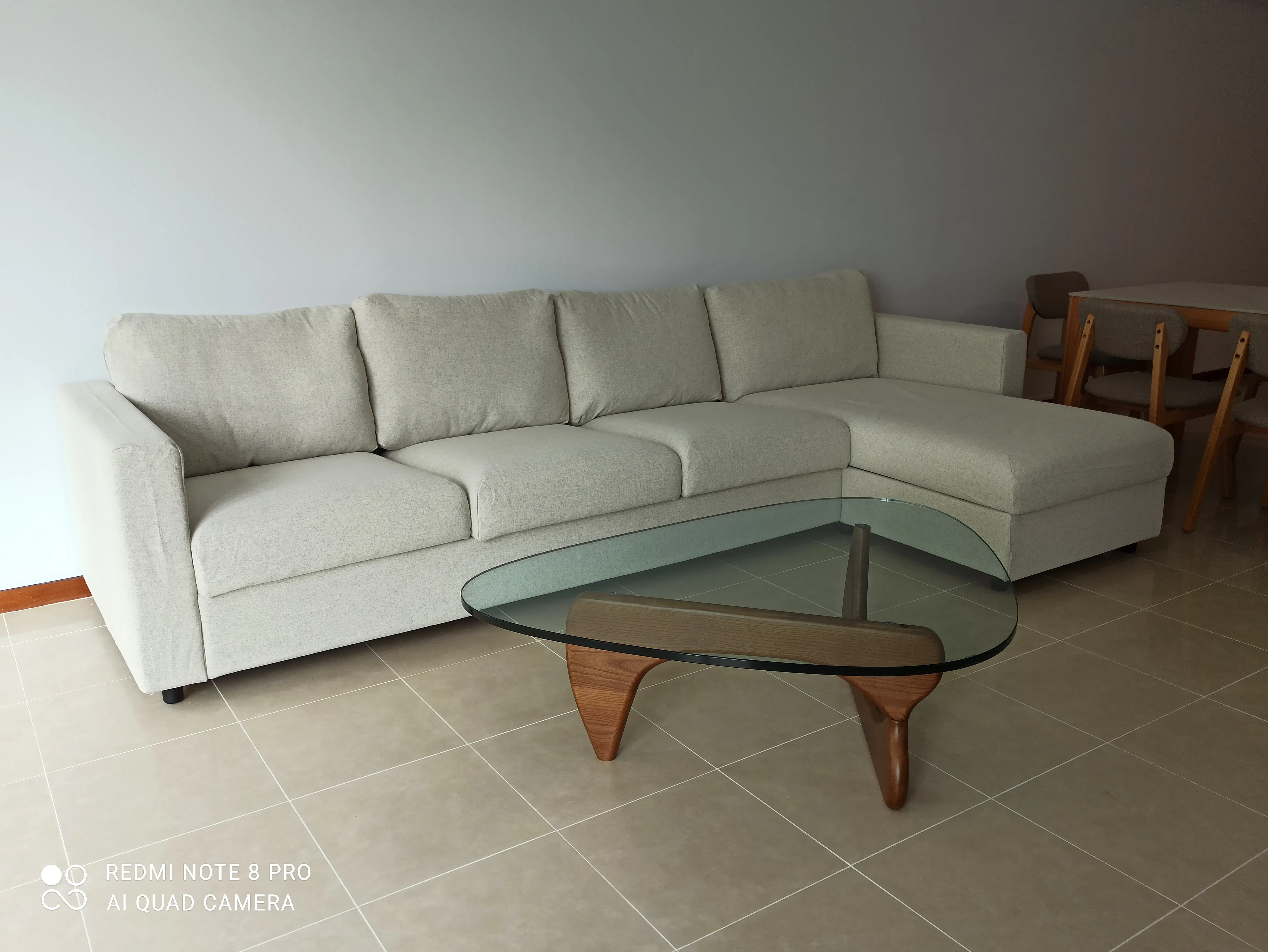 Customer home photo 2: It is stylish, well made and very sturdy.  The tempered glass is 2cm thick.  This piece was a perfect fit to my sofa.