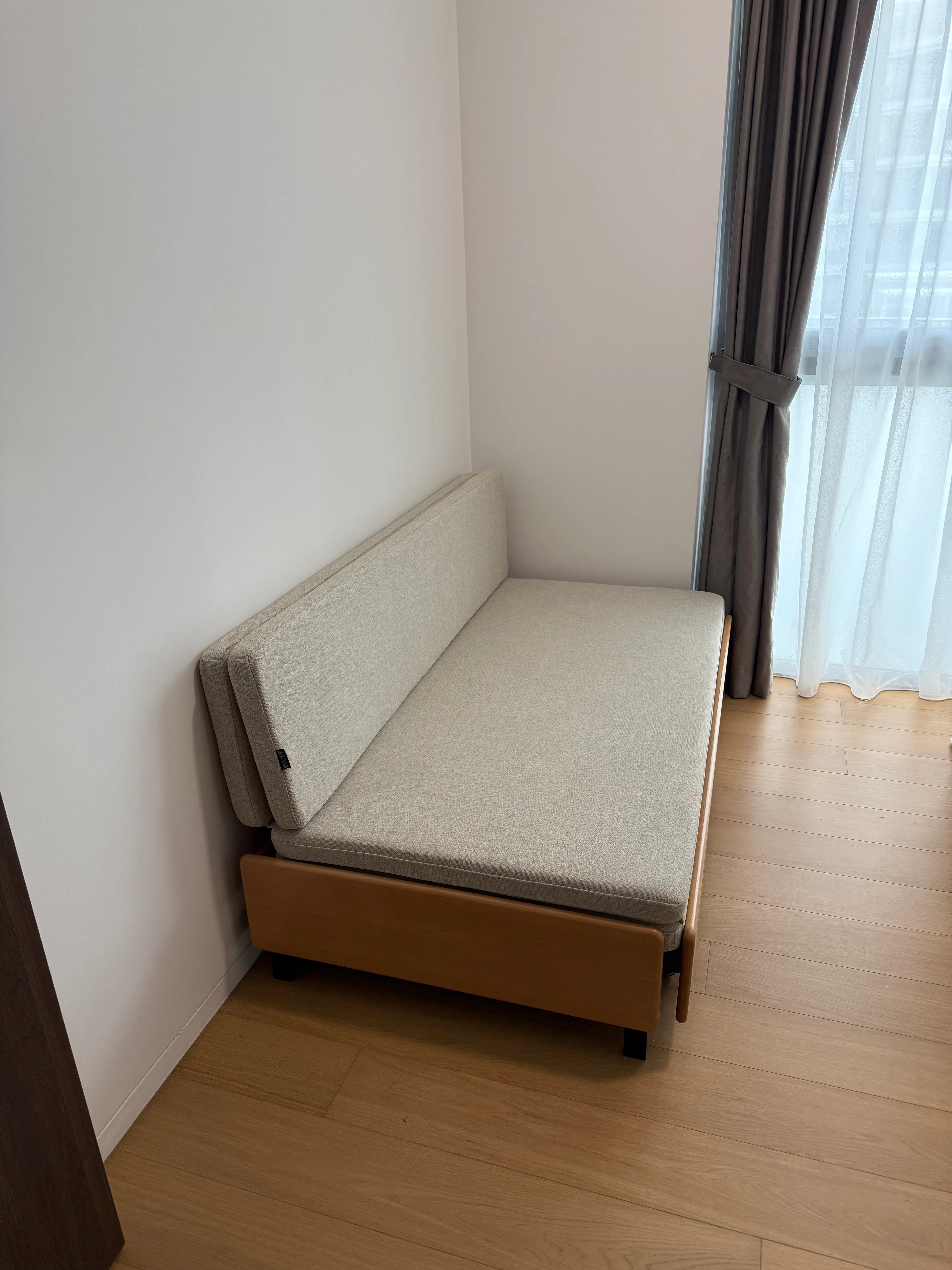 Customer home photo 1: Nice little space-saving couch / bed, perfect for our small guest room. The mattress is relatively hard, so maybe get a topper if you have a lot of guests over to make it more comfortable.